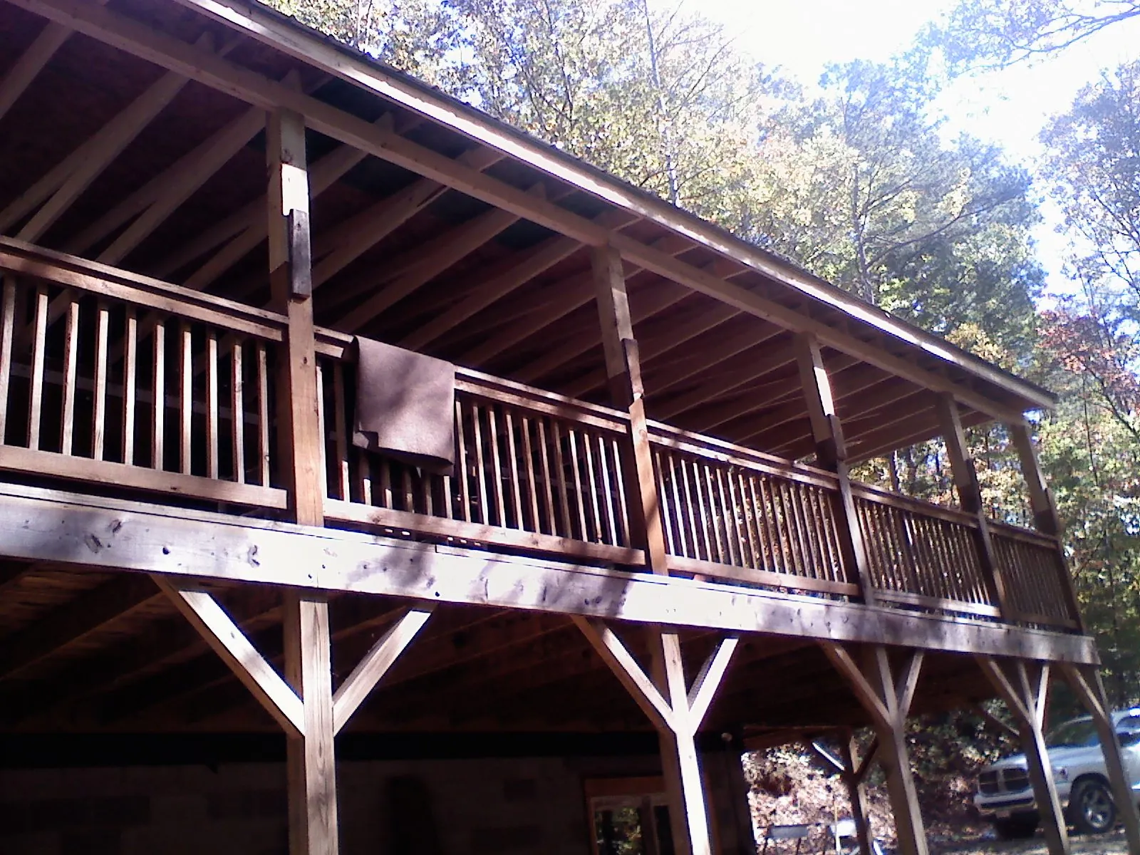 Timber framing under a new elevated porch and deck — Roof Leak Repair in Earlsboro by Roofing Brothers